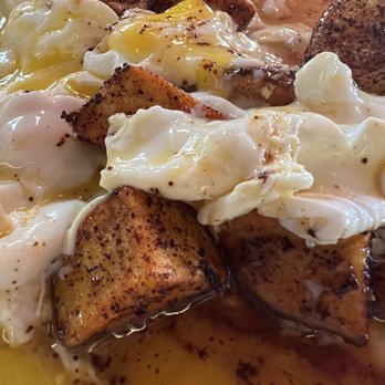 Flat Iron Grill - Classic Traditional Breakfast* - poached eggs broken over potatoes - Steakhouses Near Me - Issaquah, Washington