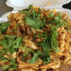 Bhel puri topped with cilantro, the way it's supposed to be.