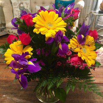 Currans Flowers - Flowers for a rainy day - made on the spot too! Amazing talent here :) - Florists Near Me - Danvers, Massachusetts