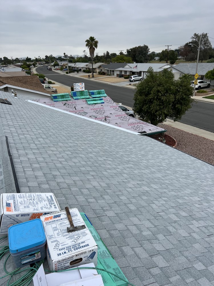 Slide of Leon K Miller Roofing