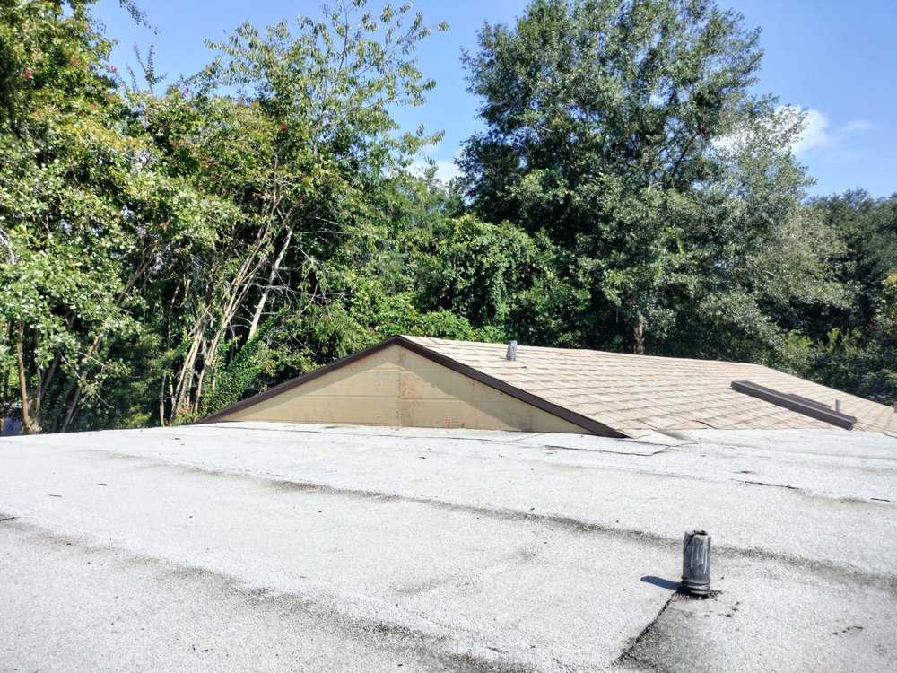 Slide of Land Roofing Company