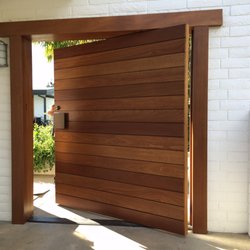 Clark Construction - Offset piviot custom mahogany entry door