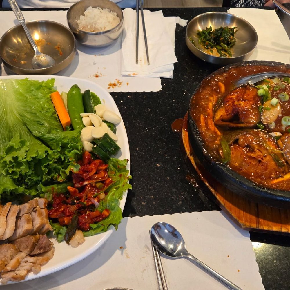Mindeulle - Our table with bossam and un-deh-gu (black cod) stew. - Korean Near Me - Buena Park, California Mindeulle - Our table with bossam and un-deh-gu (black cod) stew. - Korean Near Me - Buena Park, California