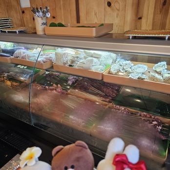 Enkari - Refrigerated case with seafood and skewers before grilling - Barbeque Near Me - Honolulu, Hawaii Enkari - Refrigerated case with seafood and skewers before grilling - Barbeque Near Me - Honolulu, Hawaii