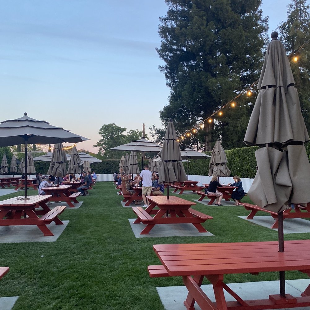 Gott's St. Helena - Tables and green grass - Burgers Near Me - Saint Helena, California Gott's St. Helena - Tables and green grass - Burgers Near Me - Saint Helena, California