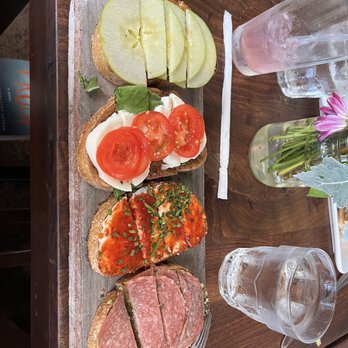 Postino East - Bruschetta Board Apple & Fig Mozzarella & Tomato Sweet n' Spicy jam Salami & Pesto (Drink was a Prickly pear lemonade 10/10!) - Wine Bars Near Me - Gilbert, Arizona Postino East - Bruschetta Board Apple & Fig Mozzarella & Tomato Sweet n' Spicy jam Salami & Pesto (Drink was a Prickly pear lemonade 10/10!) - Wine Bars Near Me - Gilbert, Arizona