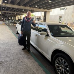 Super Limousine Service - Me being picked up from the airport; car and driver were ready and waiting! :)