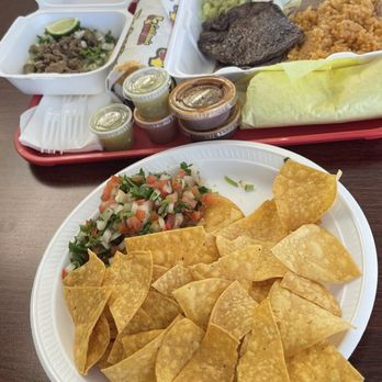 California Burrito - Chips with salsa. Carne asada and Super Burrito with Everything - Mexican Near Me - Lodi, California California Burrito - Chips with salsa. Carne asada and Super Burrito with Everything - Mexican Near Me - Lodi, California