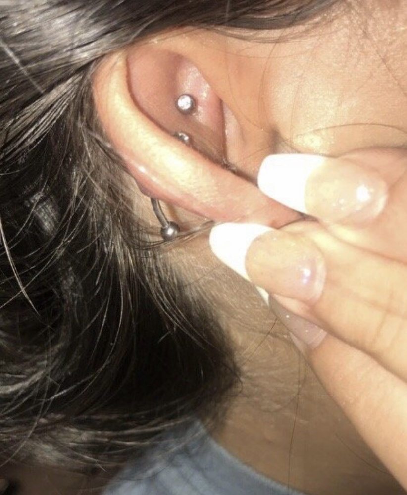 Ouch! Piercings and Tattoos Logo