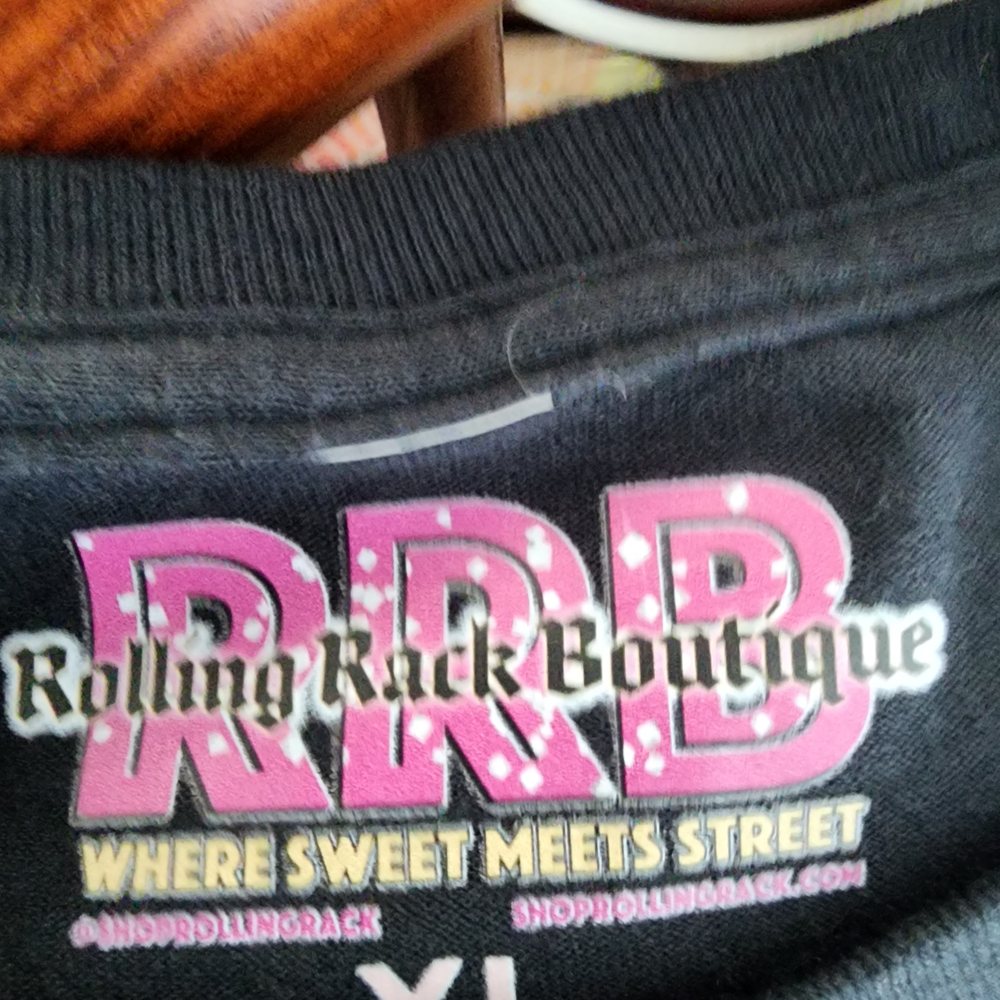 Rolling Rack Boutique - Tag was removed which would show the type of material and store logo stamped on t-shirt - Women's Clothing Near Me - Scottsdale, Arizona Rolling Rack Boutique - Tag was removed which would show the type of material and store logo stamped on t-shirt - Women's Clothing Near Me - Scottsdale, Arizona