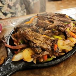 El Rodeo - Beef fajitas with bell peppers and onions.