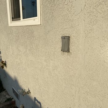 Zeus Electric and Security - Outlet on the side of the house. - Electricians Near Me