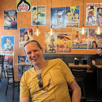 Tkrc - My friend enjoying the Kati Roll Company - Indian Near Me - Dallas, Texas