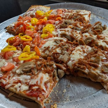 Maietta Restaurant - Half of the pizza had two kinds of peppers. The other half had sausage and mushrooms. - Pizza Near Me - Pittsburgh, Pennsylvania