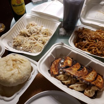 Ping's Dumpling House - Beef & Onion Big Buns (BL), Pork Xiao Long Bao (TL), Shrimp Chow Mein (TR) & Lamb Pot Stickers (BR) - Dim Sum Near Me - Seattle, Washington Ping's Dumpling House - Beef & Onion Big Buns (BL), Pork Xiao Long Bao (TL), Shrimp Chow Mein (TR) & Lamb Pot Stickers (BR) - Dim Sum Near Me - Seattle, Washington
