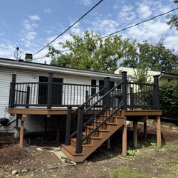 AM Carpentry Designs - 20x20 Saddle Trex Composite Deck

Location: Wheaton, Illinois
