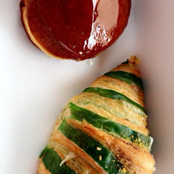 Copain Bakery & Provisions - Top: crème brûlée doughnut Bottom: pistachio croissant - Coffee & Tea Near Me - Winston-salem, North Carolina Copain Bakery & Provisions - Top: crème brûlée doughnut Bottom: pistachio croissant - Coffee & Tea Near Me - Winston-salem, North Carolina