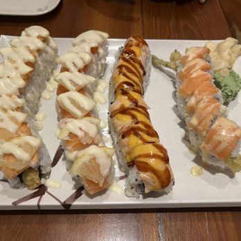 Sushi Tao - (Left to Right) Custom Golden Dragon Roll, Golden Dragon Roll, Lion King Roll, and Trinidad Roll - Japanese Near Me - Arcata, California