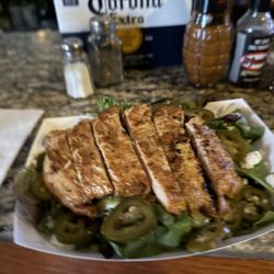 Taproom On 19th - The salad with chicken. I added pickled jalapeños, and the orange balsamic dressing is yum