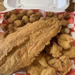 This is a #4 catfish with shrimp and I substituted the fries with fried okra and two pieces of sliced white bread