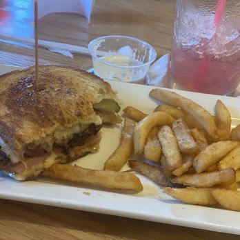 The Depot and Baggage Claim - Brisket Cuban sandwich with fries. - American Near Me - Minot, North Dakota The Depot and Baggage Claim - Brisket Cuban sandwich with fries. - American Near Me - Minot, North Dakota