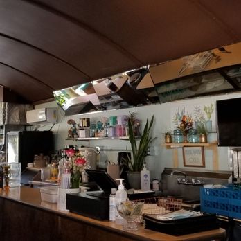 Thrive Diner - Inside... the end with all the railroad glass insulators in the window is the warm end during the winter. - Vegan Near Me - Pittsfield, Massachusetts