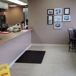 Jay's Famous Hot Dogs - Ordering area and stool seating at front window.