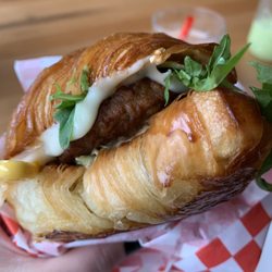 WildFlour Cafe & Bakery - Breakfast sandwich w/ veggie sausage on plain croissant