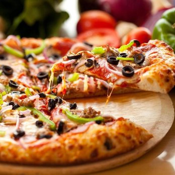 Allen's New York Pizza - a pizza on a cutting board - Pizza Near Me - Carlsbad, California Allen's New York Pizza - a pizza on a cutting board - Pizza Near Me - Carlsbad, California