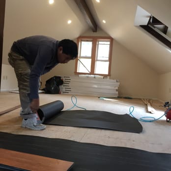 Los Angeles Flooring Stores - 1906 Carriage House in Harvard Heights -prepping to lay distressed pub floor in the hay loft. - Flooring Near Me - Chatsworth, California