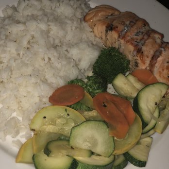 Whiskey Warehouse - Bourbon butter salmon with rice & seasonal veggies - Pubs Near Me - Charlotte, North Carolina