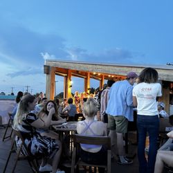 The Wonderer Charleston - Lounging on the rooftop deck at The Wonderer enjoying some live music.
