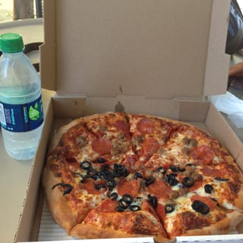 Pizzasaurus Rex - Pepperoni pizza with sausage and olives on half of it from Pizzasaurus rex - Pizza Near Me - Northridge, California Pizzasaurus Rex - Pepperoni pizza with sausage and olives on half of it from Pizzasaurus rex - Pizza Near Me - Northridge, California