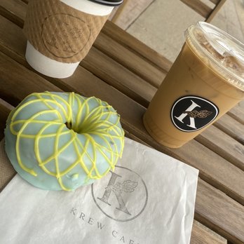 Krew Cafe - Ohana lemon and lavender Doughnut, iced Americano and Americano hot @ Krew Cafe. - Bakeries Near Me - Edmonton, Alberta Krew Cafe - Ohana lemon and lavender Doughnut, iced Americano and Americano hot @ Krew Cafe. - Bakeries Near Me - Edmonton, Alberta
