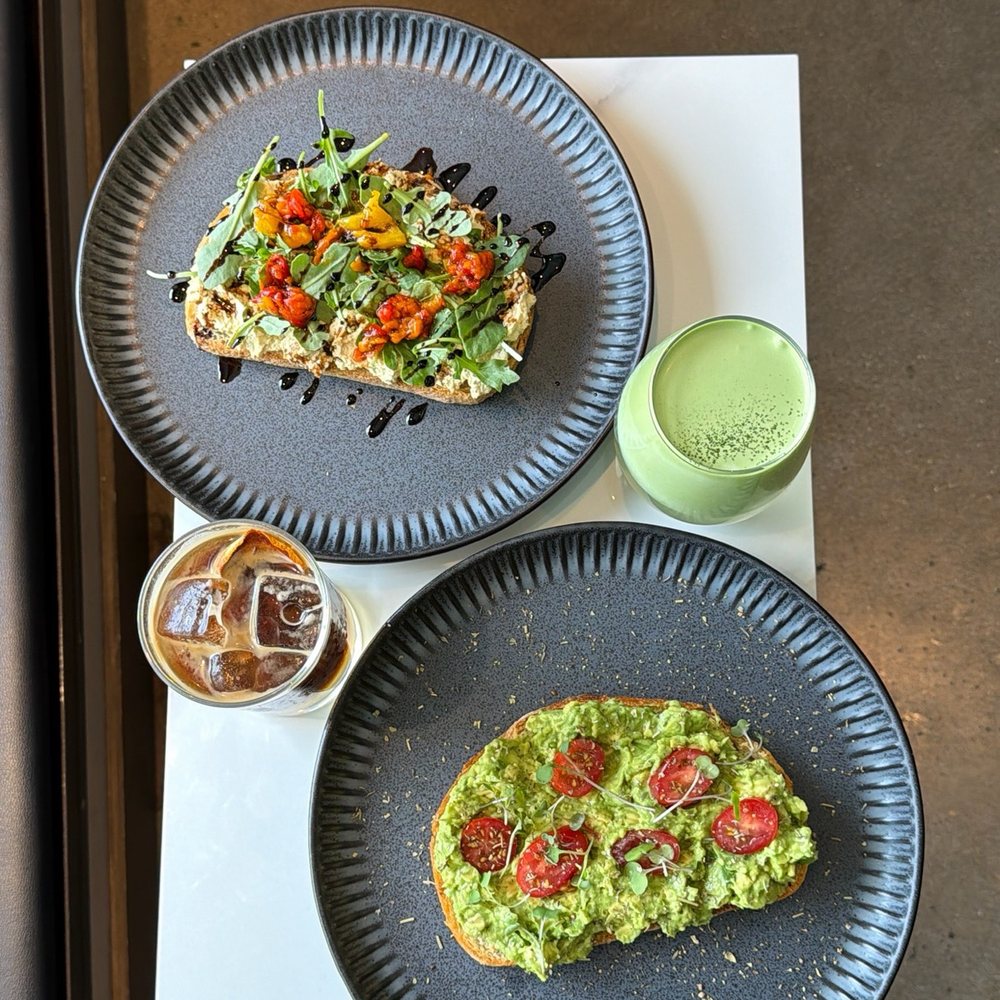 Moment Coffee - Truffle avocado toast and moment's favorite toast with Matcha coconut cloud and Orange Espresso Tonic - Coffee & Tea Near Me - Seattle, Washington Moment Coffee - Truffle avocado toast and moment's favorite toast with Matcha coconut cloud and Orange Espresso Tonic - Coffee & Tea Near Me - Seattle, Washington