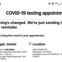 a phone screen with a text message stating that there is a covidid - 19 string appointment