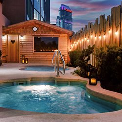 Burning Springs Spa & Thermal Pools - The outdoor Thermal Pools and relaxation area takes on a peaceful glow at dark.