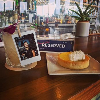 Deck. - Can't say much more about the service they reserved me a spot with desert a drink and the bartender on it as a garnish ready to greet me! - Hawaiian Near Me - Honolulu, Hawaii
