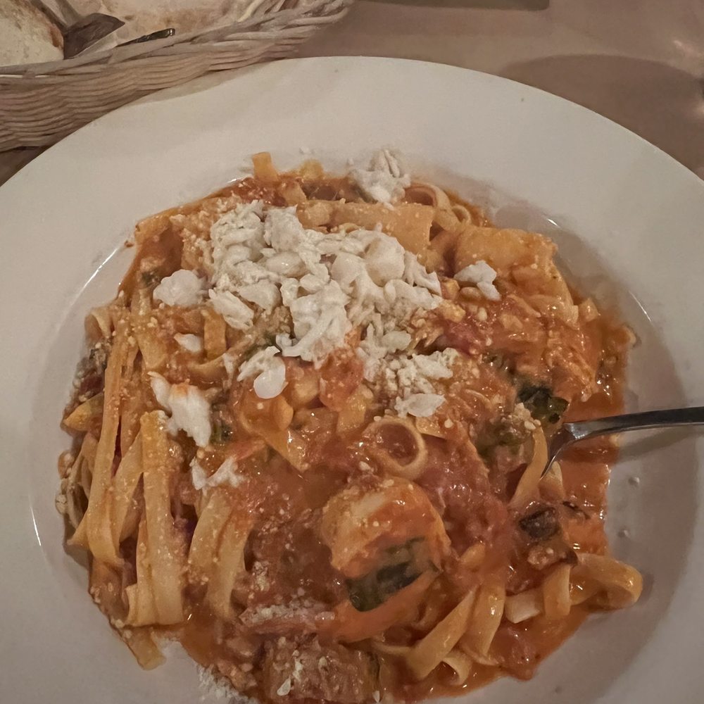 Fettuccine De Mare off specials menu with shrimp, scallops, and crab in a rose sauce. Fettuccine De Mare off specials menu with shrimp, scallops, and crab in a rose sauce.