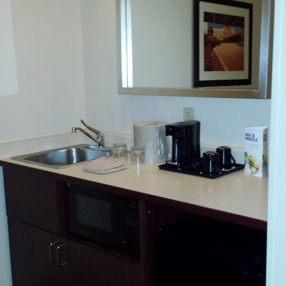SpringHill Suites by Marriott Minneapolis Eden Prairie - Sink, coffee, microwave, and refrigerator area across from the desk area. - Hotels Near Me - Eden Prairie, Minnesota SpringHill Suites by Marriott Minneapolis Eden Prairie - Sink, coffee, microwave, and refrigerator area across from the desk area. - Hotels Near Me - Eden Prairie, Minnesota