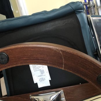 Circle Furniture - Nasty scrapes on base of chair from mishandling by delivery or construction personnel - Furniture Stores Near Me - Cambridge, Massachusetts