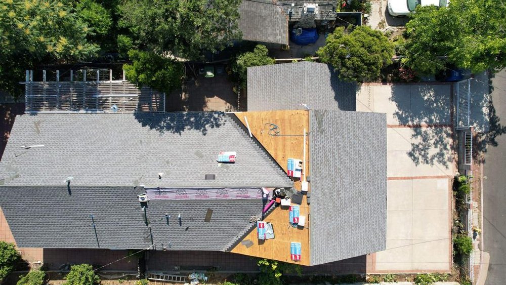 Slide of CJP Roofing Solutions