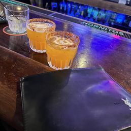 three glasses of orange juice three glasses of orange juice