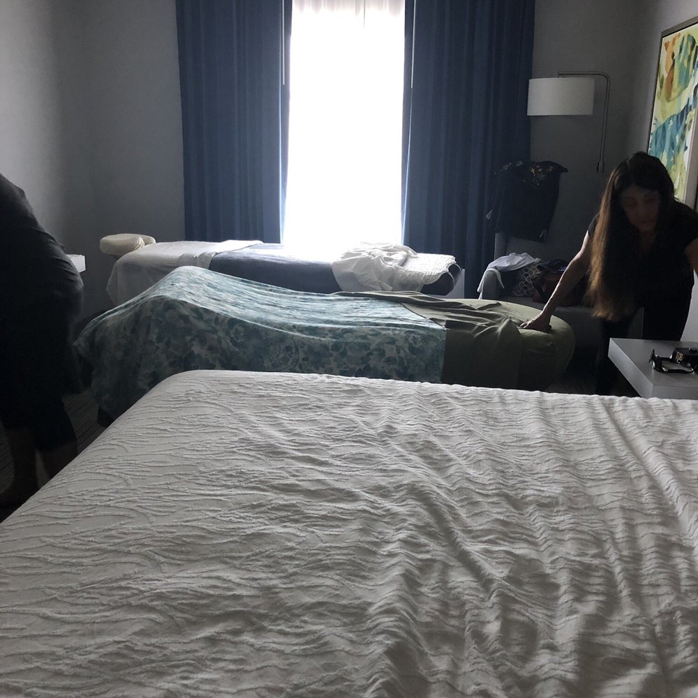 The massage therapist getting ready to do their magic! The massage therapist getting ready to do their magic!