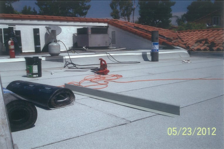 Slide of C B E Roofing