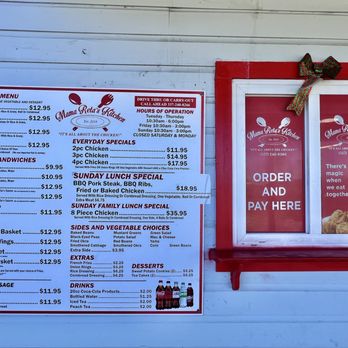 Mama Reta's Kitchen - Entrance - menu on left, order window on right where we were promptly greeted by the cheerful Mama Reta. - Soul Food Near Me - Lake Charles, Louisiana Mama Reta's Kitchen - Entrance - menu on left, order window on right where we were promptly greeted by the cheerful Mama Reta. - Soul Food Near Me - Lake Charles, Louisiana