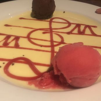Manolo Tapas - Un Canto a Kiara--Chocolatey, rich, balanced well with raspberry sorbet - Tapas Bars Near Me - New York, New York Manolo Tapas - Un Canto a Kiara--Chocolatey, rich, balanced well with raspberry sorbet - Tapas Bars Near Me - New York, New York