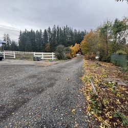 Gatica Lawn Care - This picture shows the driveway & gate into the area for dumping wood chips. 18520 83rd Ave. SE 425-753-3255