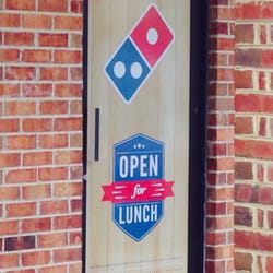 Domino's Pizza - We love Dominos pizza! Fast delivery prepared in a super clean modernized restaurant. Tables for dinning in.