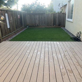Garden Mamas - The deck is wet so it changes the appearance a bit. Note that we did not have them replace our old fence. - Landscaping Near Me